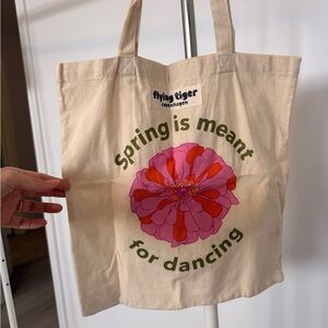 Flying Tiger Cream Tote Bag with Pink Flower Design